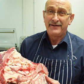 Butcher at Lewis’s Farm Shop in Wrexham