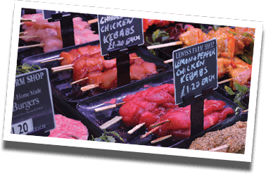 A selection of meats at the butcher’s counter in Lewis’s Farm Shop